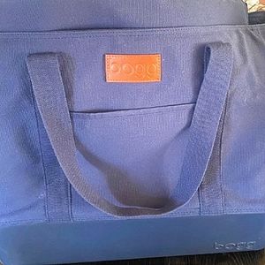 Canvas Bogg Bag. Colors are Navy Blue & Olive.